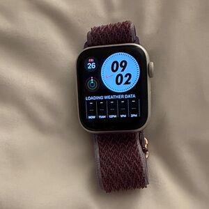 Smartwatch with Burgundy Strap. Only used twice!!! Thought I would use it more.